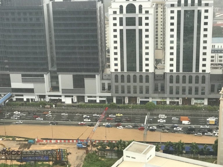 federal highway in mid valley area badly flooded after heavy monsoon showers world of buzz 3