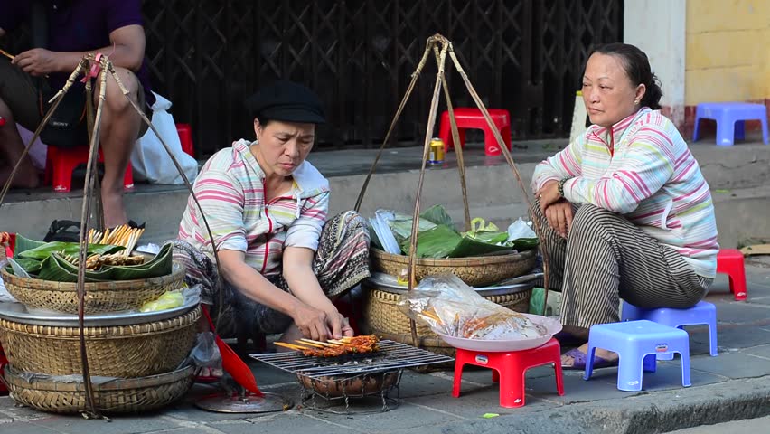 Street Vendor In Saigon