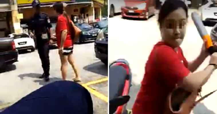 Furious Woman Uses Steering Lock To Attack Dbkl Officers For Clamping Her Car World Of Buzz 7