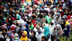 Indonesian People Queue To Get Free Food Without Social Distancing Amid The Coronavirus Disease Covid 19 Outbreak In Bogor 1