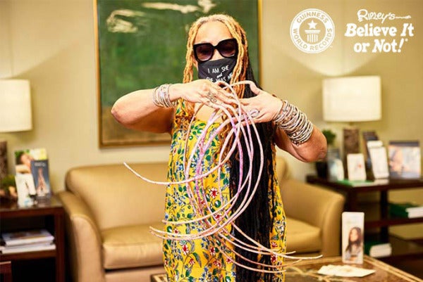 Ayanna Williams in dermatologist office with longest nails watermark tcm25 654371 e1618020300851