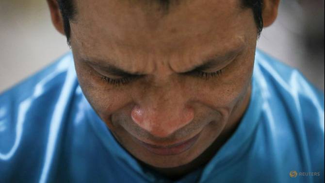 Rohingya Refugee And Activist Zafar Ahmad Abdul Ghani Cries During A Prayer At His Home In Kuala Lumpur 4