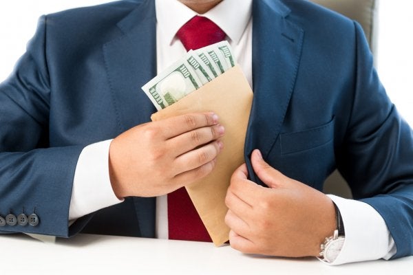 Depositphotos 75945177 Stock Photo Conceptual Photo Of Bribed Man