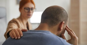 Woman Therapist Consoling Male Patient 1200X628 Facebook 1200X628 1