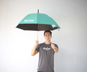 Talent with GoCar umbrella