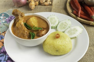 Nasi Kunyit With Curry Chicken