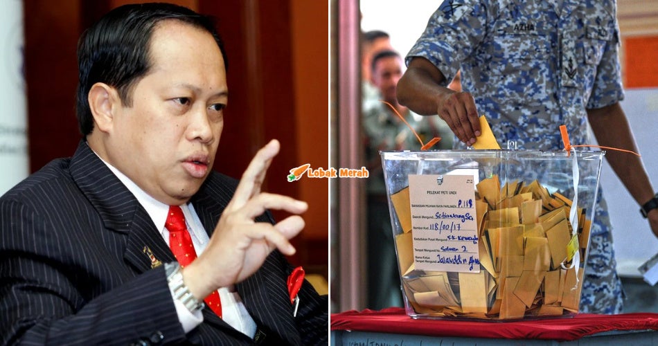 Pakai Payung Mengundi Ahmad Maslan