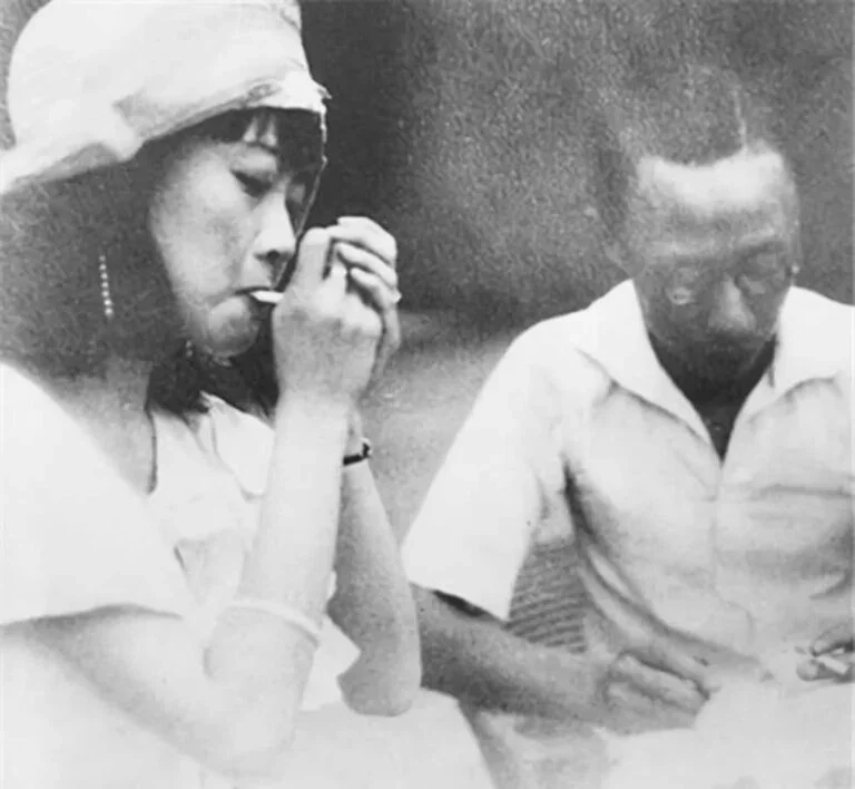 empress wanrong smoking cigarette 768x708 1