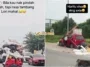 axia merah angkut barang atas kereta