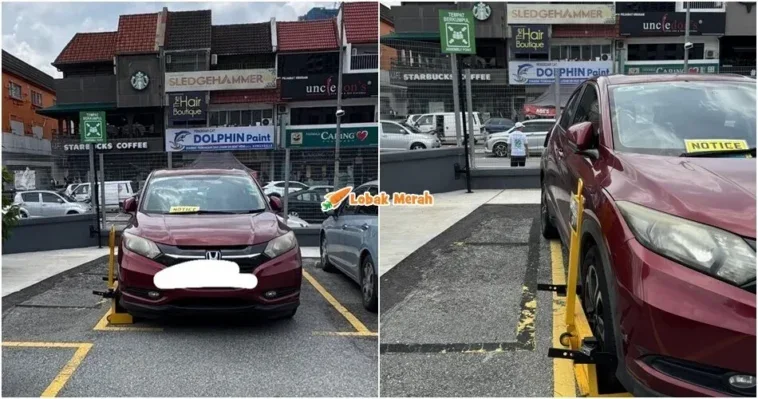 kereta kena clamp tayar terkeluar dari kotak parkir
