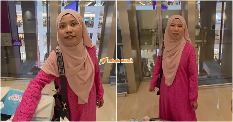 wanita bawa stroller bengang kemudahan lif