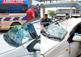 lelaki terjatuh dari bangunan ke atas sebuah kereta