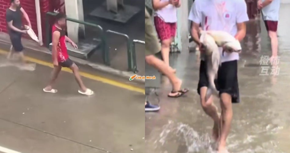 Penduduk Macau ‘Pancing’ Ikan Di Jalan Banjir Lepas Taufan Ragasa