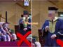 graduan tunjuk pandang kamera majlis konvokesyen uitm